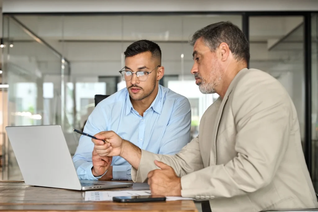 bookkeeping men talking to each other 1